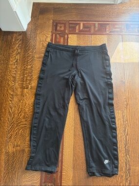 Nike Kids Black Sweatpants with White Swoosh